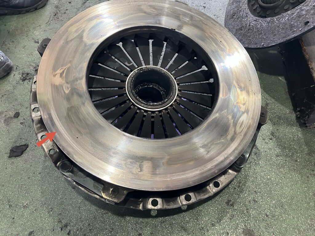 Large truck clutch cover rivet contact damage